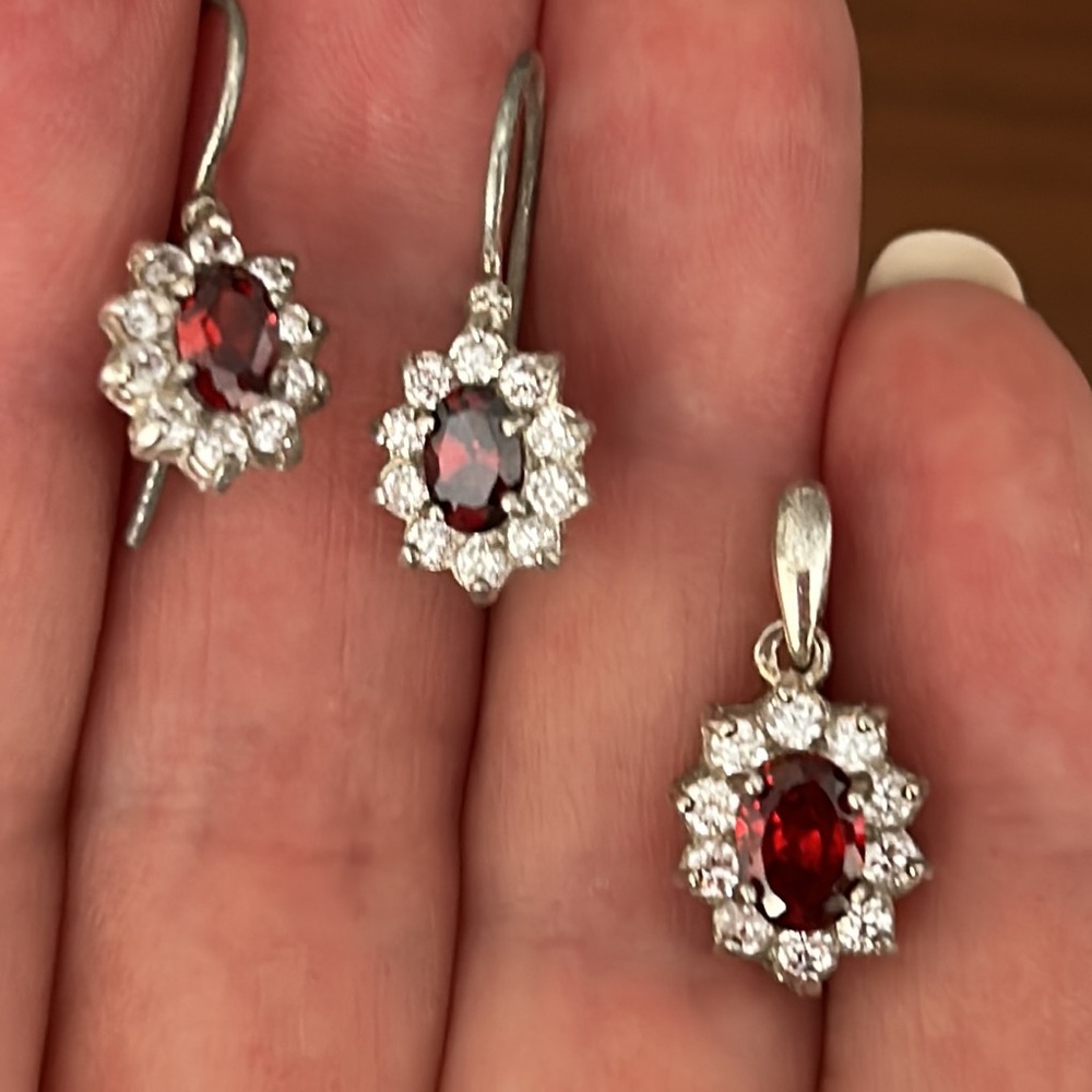 Silver earrings and necklace with matching pendant